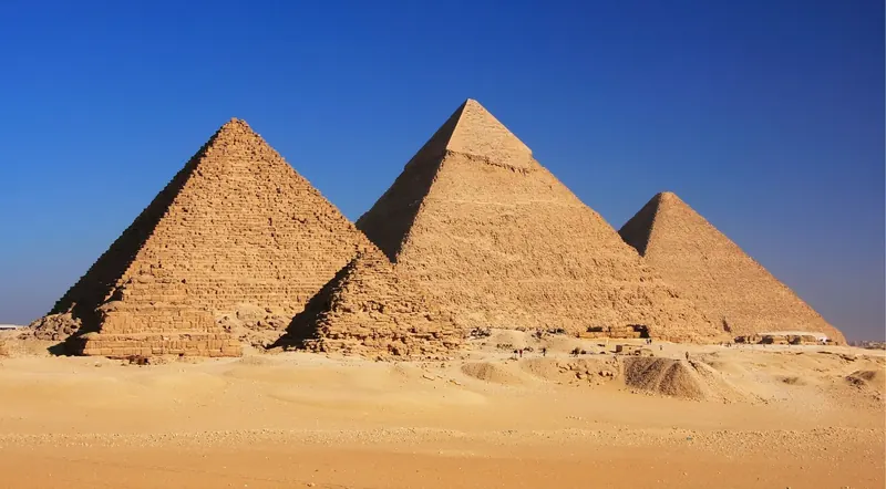 The Pyramids of Giza rising over the desert plateau
